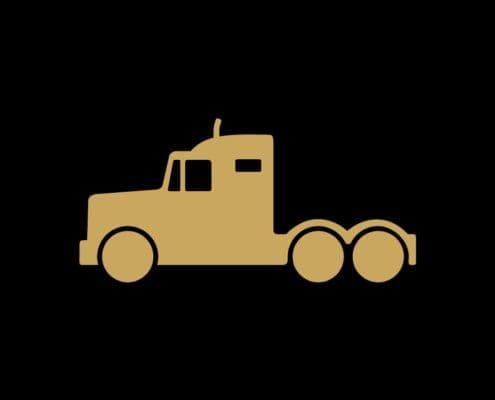 Gold silhouette of a semi-truck on a black background, highlighting the strength and reliability synonymous with the Asset Valuations Group.